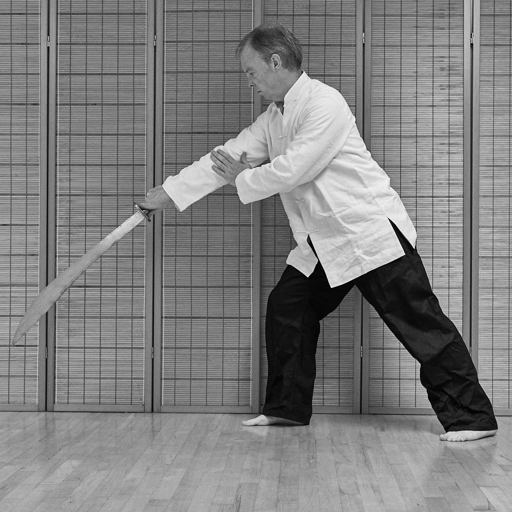 Sifu Stephen Forde holding a dao - Broad Sword
