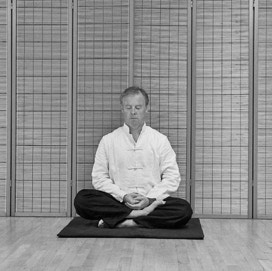Stephen Forde in a sitting meditation posture